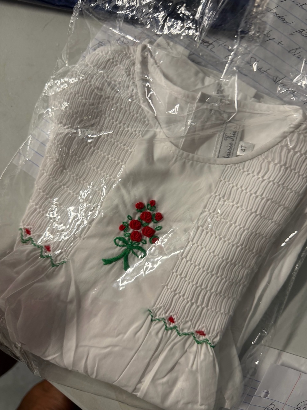 Smocked size 4 white dress with flower in the middle new with tags